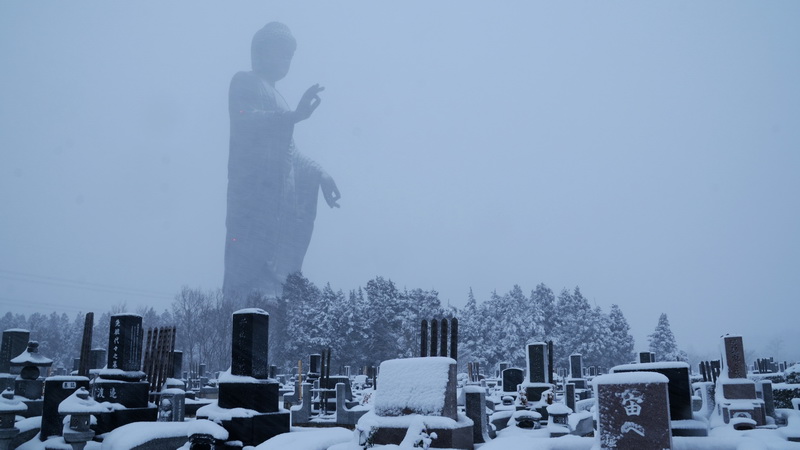 Buddha and cemetery.jpg